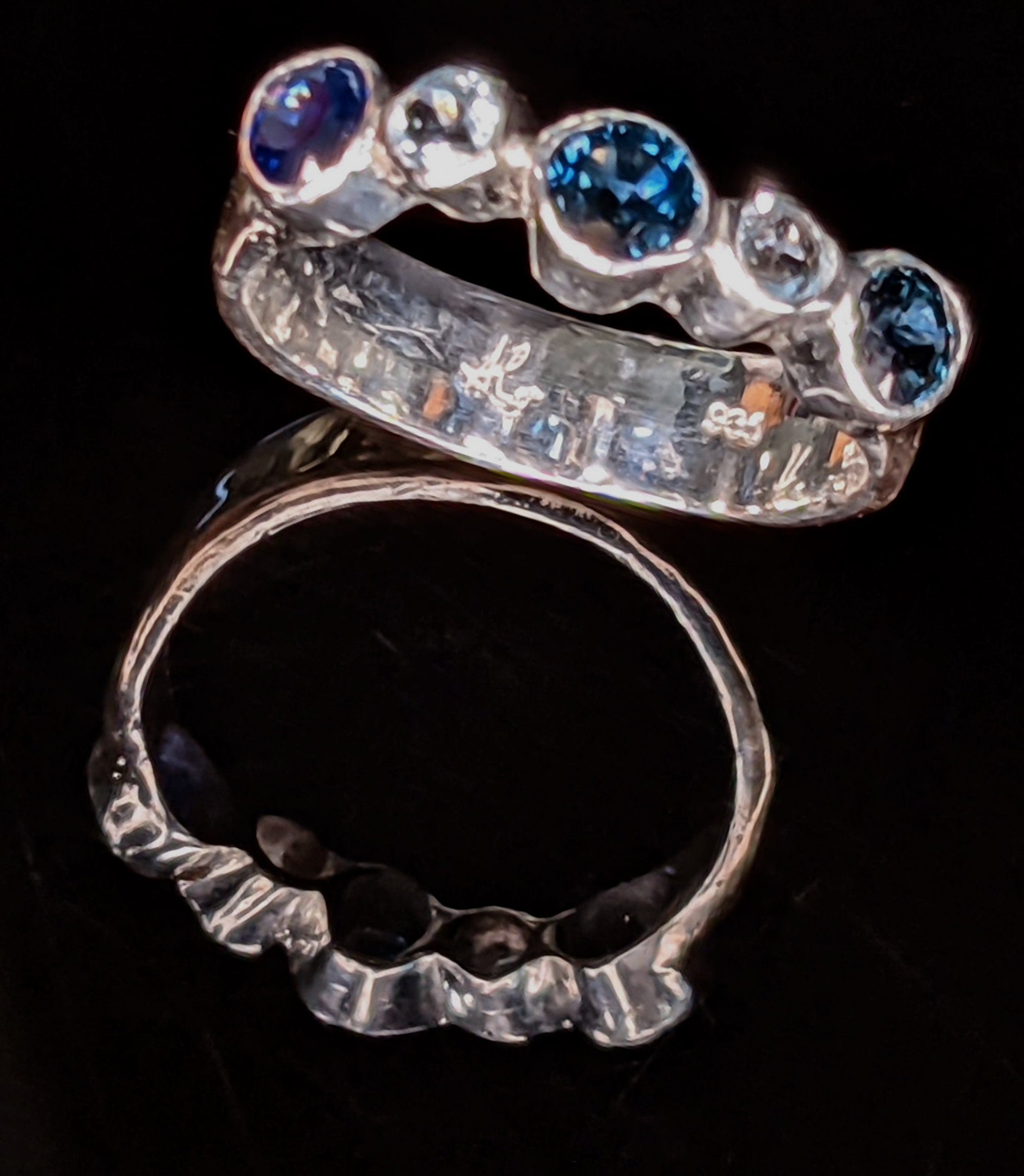Blue saffire and sky blue topaz gold  ring